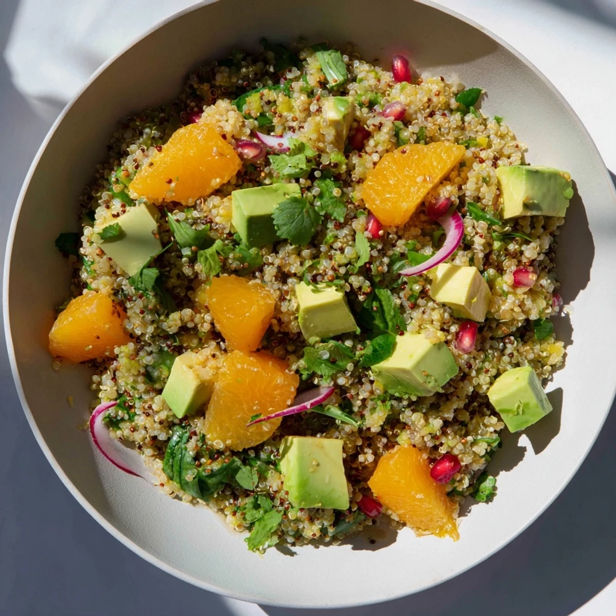Showcasing fresh ingredients, this Fresh Citrus & Avocado Quinoa Bowl includes vibrant citrus segments and creamy avocado.