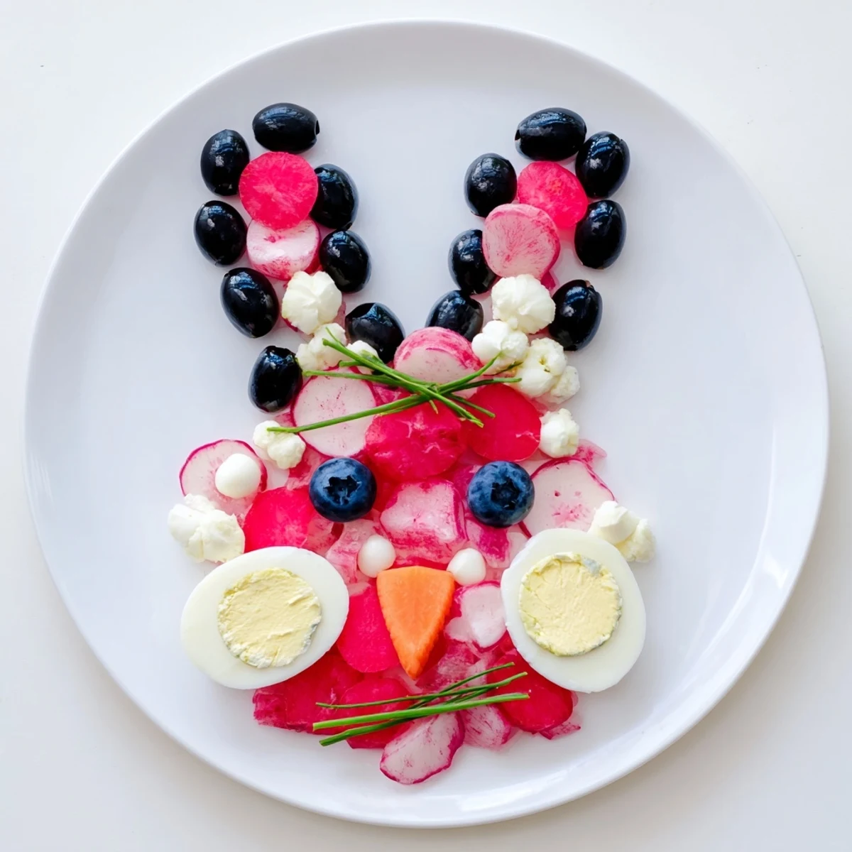 Festive Bunny Silhouette appetizer, featuring a charming rabbit outline filled with refreshing, healthy ingredients and ready to serve.