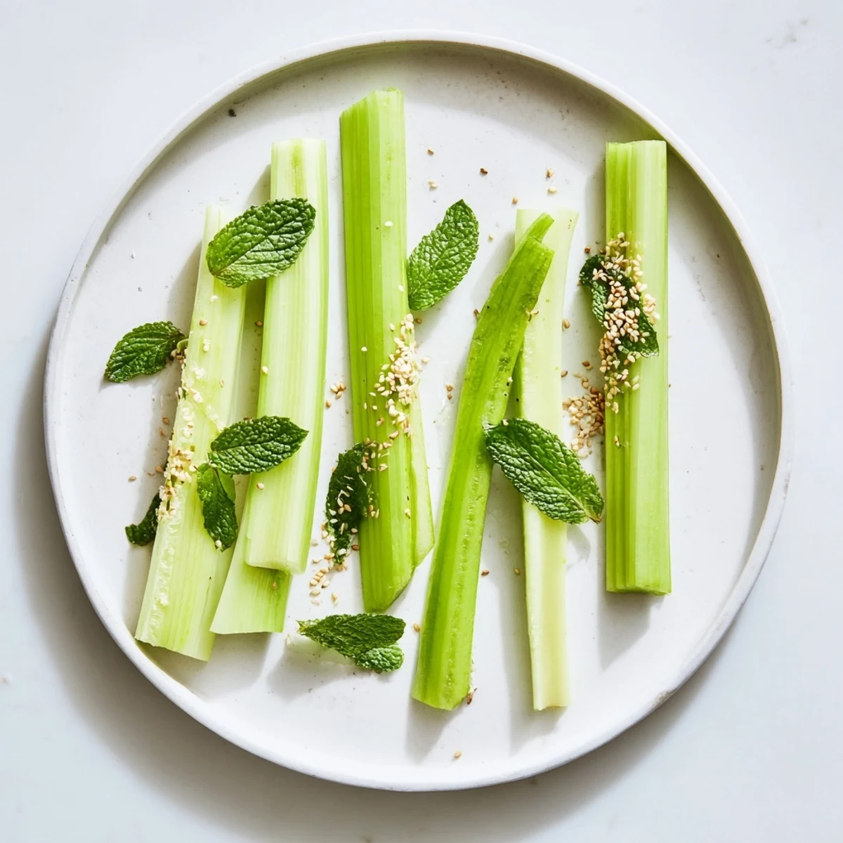 Fresh, crisp The Bamboo Zen appetizer with celery and cucumber, perfect for a refreshing, vegan bite.