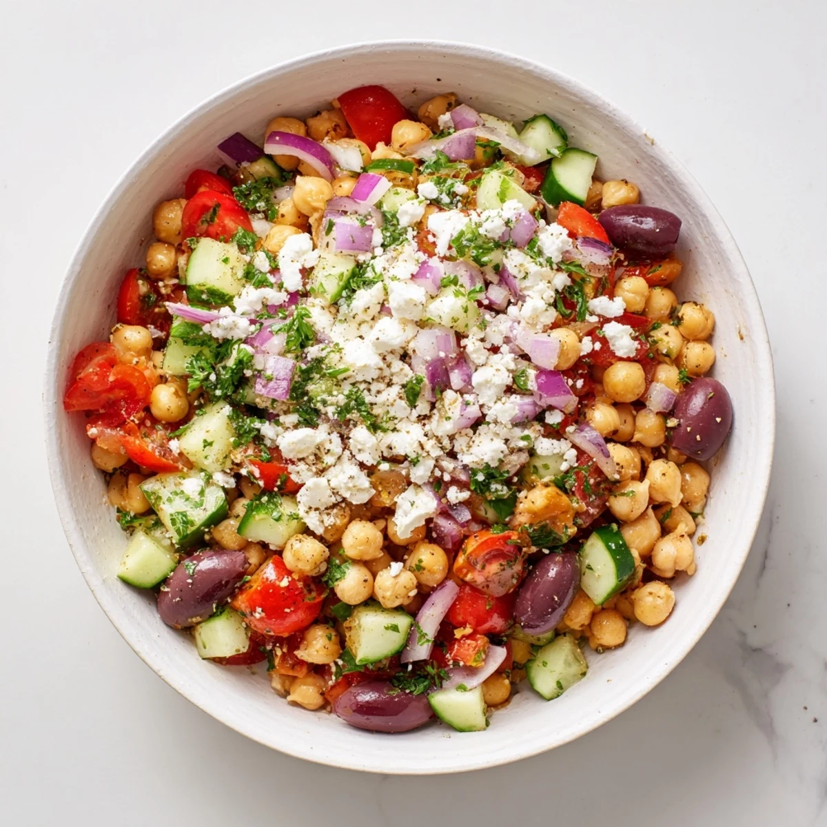 Mediterranean Chickpea and Feta Bowl, a colorful plate of vibrant Mediterranean flavors, ready to eat.