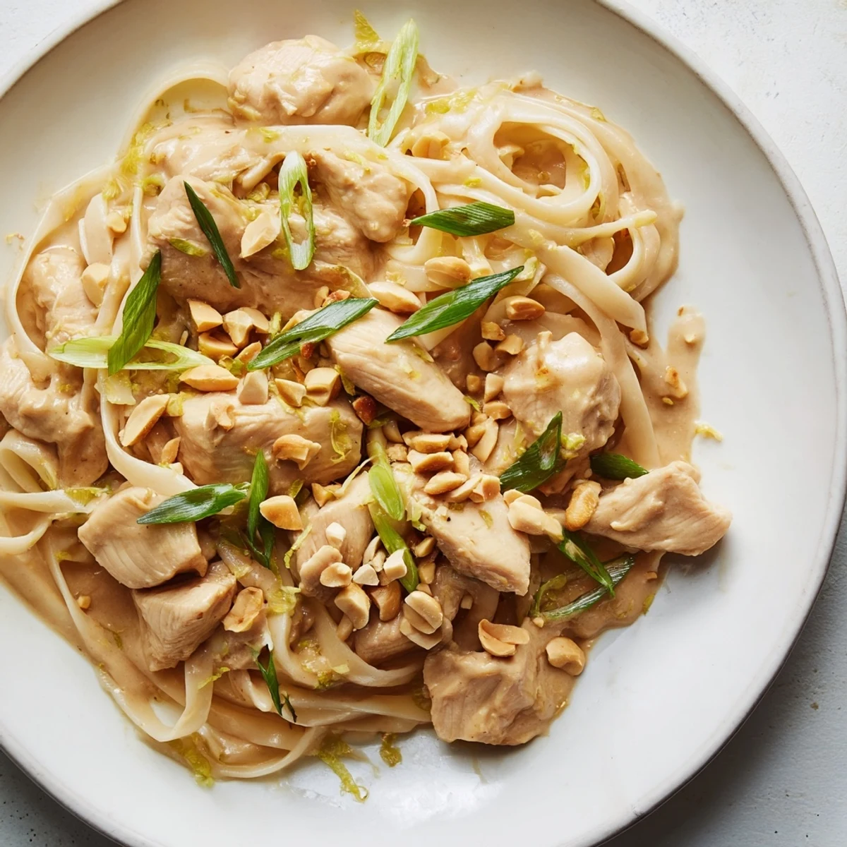 Creamy, flavorful Thai Peanut Chicken Pasta, a quick and satisfying dinner option with tender chicken.