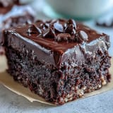 Dark chocolate chips stud these moist Fiber-Maxxing Bean Brownie Bites hot from the oven.