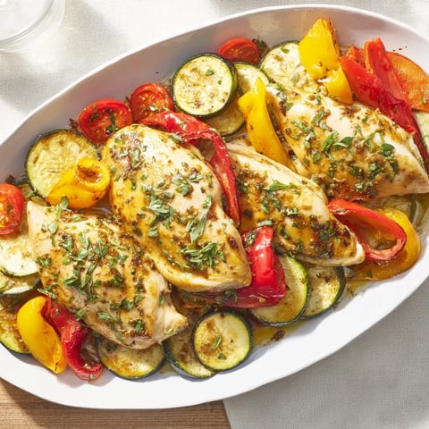 Juicy, Basil-Soft Chicken and Veggie Sheet Pan Dinner, a colorful, easy-to-make, weeknight delight.