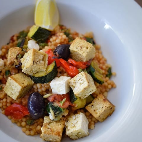 Sizzling lamb combines with orzo in this rich Smoky Mediterranean Lamb and Orzo Supper dish with fresh herbs.