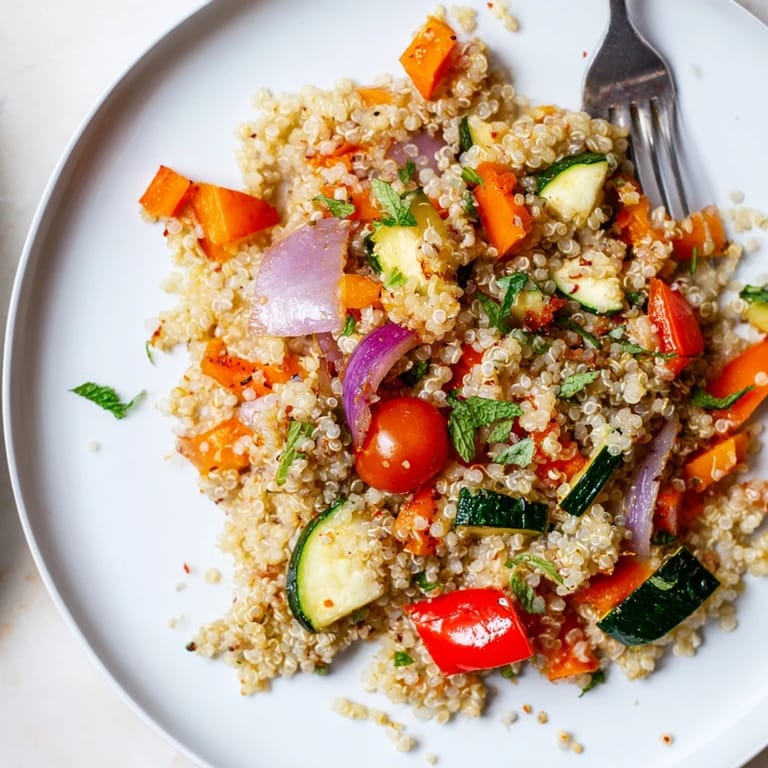 This Quinoa Vegetable Pilaf showcases tender, roasted seasonal vegetables mixed with aromatic herbs and spices, served warm as a satisfying, healthy meal or flavorful side.