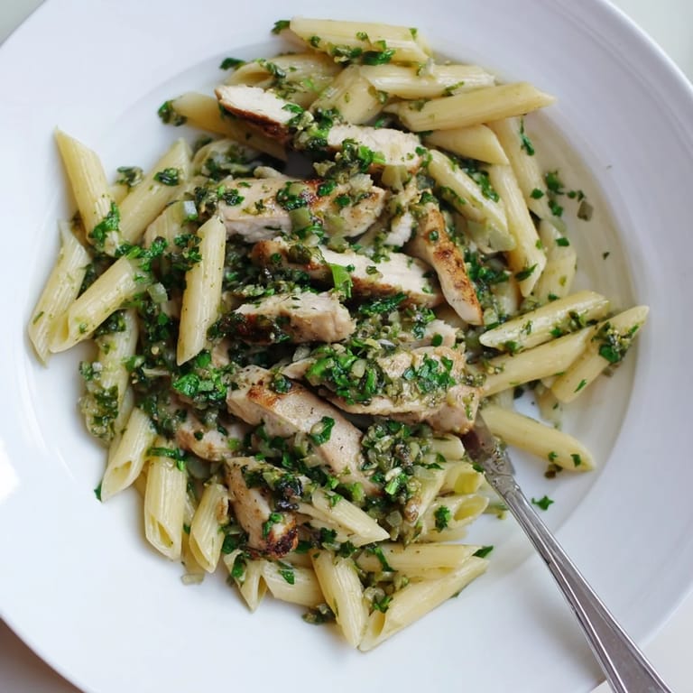 This easy Chimichurri Chicken Pasta features tender meat, olive oil, and fresh parsley, making a colorful and flavorful weeknight dinner.